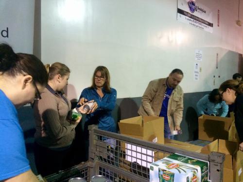 ASM employees working at the food bank.
