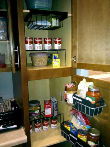 Locker shelves being used to organize a pantry.