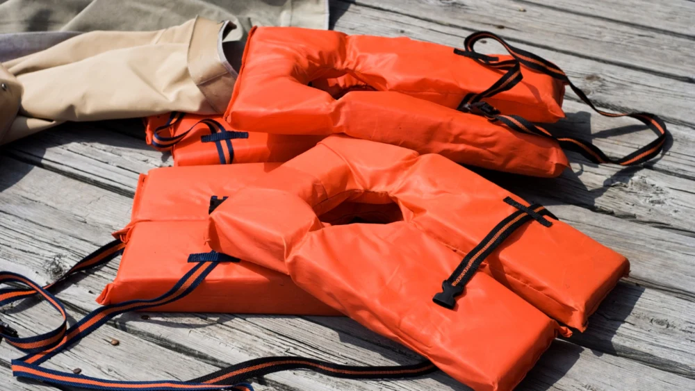 Life jackets lying in a boat.