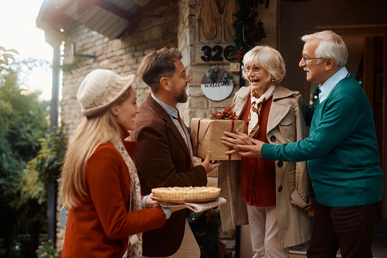 Two parents welcome their kids into their home for the holiday season.