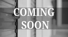 Coming soon image of a storage unit with overlayed text