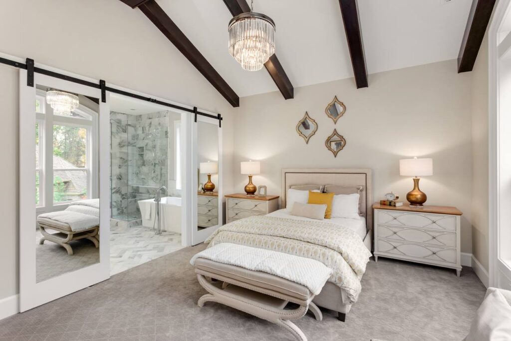 A newly renovated main bedroom inside a luxury house.