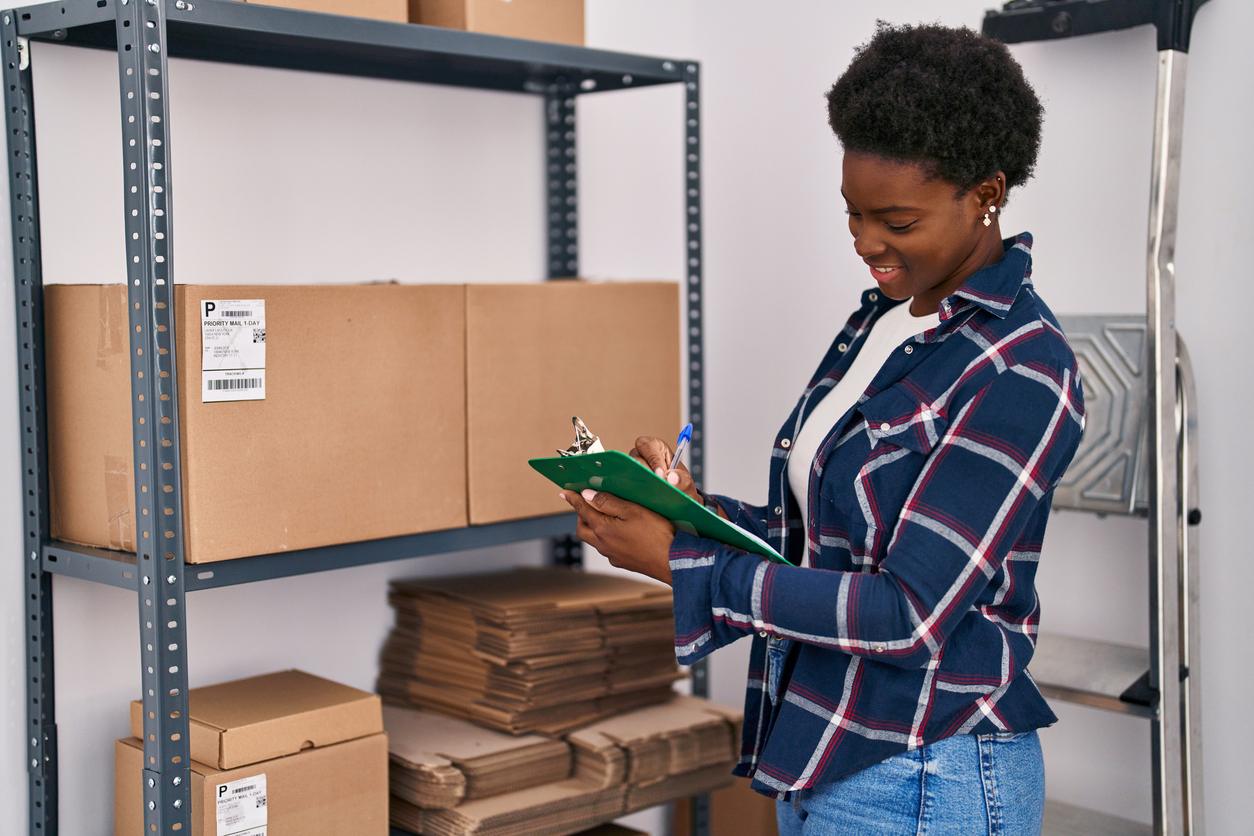 A woman manages inventory in her business self-storage unit.